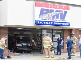 Update Van Crashes Through Stark County Bmv Stops At Counter News The Repository Canton Oh