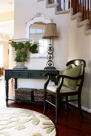 Comfy Chair Also Pillow Feats Black Console Table Plus Modern Foyer Decorating Idea Also Round Area Rug Foyer Table Decor Entryway Table Decor Foyer Decorating