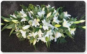 Maybe you would like to learn more about one of these? White Lily Casket Spray Funeral Flowers Beautiful And Tasteful Flowers For All Occasions Brownhills Walsall 01543 453572