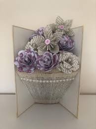 Folded Book Art Vase Shape With Paper Flowers In 2020 Folded Book Art Book Folding Paper Flowers