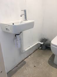 Hang a curtain or fabric in front of the pipes for easy access to them. Help Hiding Pipes In Downstairs Toilet Houzz Uk
