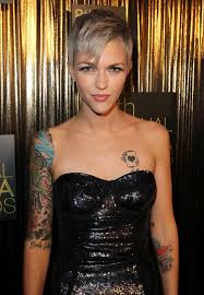 Actress displays clear skin on her neck where two inkings but ruby rose appears to have had two of her most famous tattoos lasered off: Ruby Rose Artistic Design Tattoo Ruby Rose Tattoos Lookbook Stylebistro