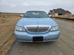 Image result for Light Ice Blue 2005 Town Car