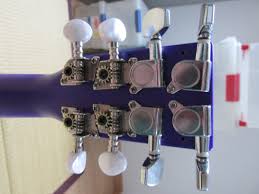 If you're starting to find that your collection of seashells is getting a little overwhelming, i have a got a beach décor project for you! Make An 8 String Ukulele From Your Normal Ukulele 8 Steps With Pictures Instructables