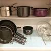 Now it's time to organize the contents of your kitchen cabinets that you're keeping. 1