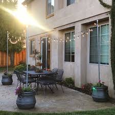 Blog Archive Diy Patio Planters And Light Poles In 2020 Outdoor Patio Lights Patio Planters Diy Patio