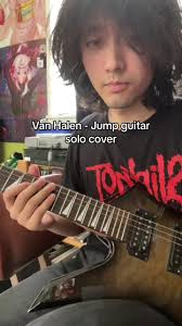 Guy Playing Guitar Jumping