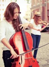 Two Women Strings Duet Playing Violin And Cello On The Street Musician Photography Cello Musician Portraits