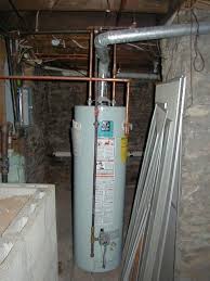Electric resistance heaters with exposed coils emit large amounts of infrared heat. Hot Water Heater Basement One Of Three Chimneys On Right Kitchen Dining Room Chimney And New Concrete Block Concrete Blocks Hot Water Heater Yard Landscaping