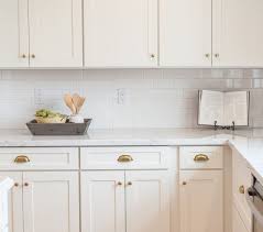White Subway Tile White Cabinets Marble Counter And Brushed Gold Hardware By Rafterhouse In Phoenix Az White Shaker Kitchen Kitchen Design Best Kitchen Cabinets