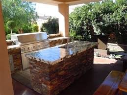 Concrete is another great material for outdoor kitchen countertops thanks to its high durability. Outdoor Countertops Landscaping Network
