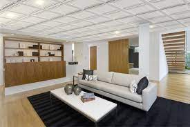 White walls, a pale blue rug and classic brown leather seating offer. Wooden Suspended Ceiling Polo Mur Design Tile Decorative