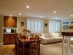 Finished Basement Ideas With Open Living And Dining Space With Traditional Furniture U Finished Living Room Finishing Basement Living Room Lighting Low Ceiling