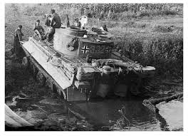 Stuck In The Mud A German Tiger Tank Crew Waits For Help To Be Pulled Out From A Muddy River Bank Tiger Tank Tanks Military Tank