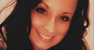 Woman trapped in crashed car survives