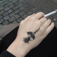 Rose tattoos are simply beautiful. 15 Small Black Rose Tattoo On Hand