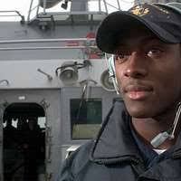 Seaman John Adams stands lookout watch