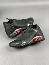 Like previous pairs, seams and ribbing are removed in favor of flat aesthetic. Nike Air Jordan 14 Se Black Ferrari Shoes