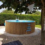 Frame Pool Mit Bambusmatten Verkleiden Geht Einfach Und Sieht Viel Schoner Aus Above Ground Pool Fram Schwimmbader Hinterhof Gartenpools Pool Uber Dem Boden