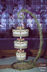This cake is quite possibly the pièce de résistance of all hanging wedding cakes. Trending Upside Down Wedding Cakes That Look Fabulous Wedmegood