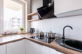 white kitchen with black sink stock