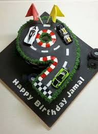 Car Birthday Cake For 6 Year Old Boy Formula 1 Racing Car Track Number Nine Cake With Toy Cars For The Hirthday Boy To Play With Afterwards From Out Cars Birthday Cake Racing Cake Race Car Cakes