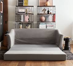 Our paidge sofa now comes in a convenient sleeper option. Soma Brady Slope Arm Slipcovered Sleeper Fabric Sofa Pottery Barn