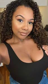 Embracing Natural Beauty and Self-Acceptance as a Young Woman