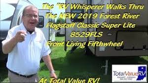 On the front wall resides a fireplace under a large window. Shortest Front Living Room 5th Wheel Forest River Forums