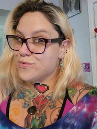 still wearing high school earrings