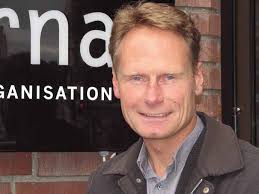 valde ny ordförande stämmer danska staten Proffsförhandlare tar över