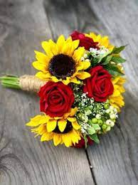 For a late summer or fall bridal bouquet, pair your sunflowers with other blooms in complementary colors, like orange tiger lilies, yellow alstroemeria, and purple stock. 190 Sunflower Wedding Bouquets Ideas In 2021 Sunflower Wedding Wedding Bouquets Wedding