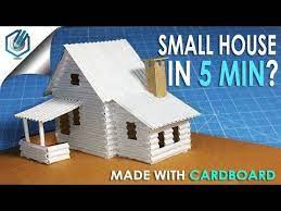 Tape the flaps on the open side of the box together to make it bigger. A Small Cardboard House With Dimensions How To Make Youtube Cardboard Box Houses Cardboard House Miniature Houses Cardboard