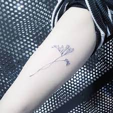 22 Beautiful And Delicate Freesia Tattoo Designs Page 2 Of 2 Tattooadore Freesia Tattoo Geometric Shape Tattoo Shape Tattoo