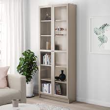 I got an ikea borgsjo bookcase with that folding back thing. Billy Bookcase With Glass Doors Grey Metallic Effect 80x30x202 Cm Ikea