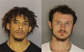 Two Edgefield men arrested and charged with murder after body found in woods