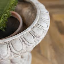 Tapered planter has a smooth finish instead of rough concrete planters you might be used to. Large Vintage Urn