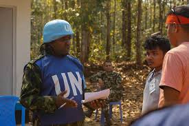 A U.N Peacekeeper from the Sri Lanka Army talks to