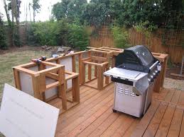 Can i build an outdoor kitchen out of wood? Diy Project Installing A Diy Outdoor Kitchen Cabinets