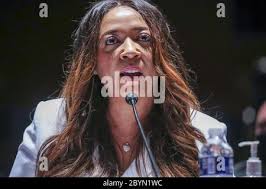 Lancaster (California) City Council member Angela Underwood Jacobs (L) and  George Floydís brother Philonise Floyd (R) are sworn in during the House  Judiciary Committee hearing