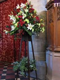 Often poinsettias are the flower of choice during christmas time. Christmas Church Flowers