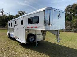 Lakota bighorn 8418 four horse 14ft slide out living quarter gooseneck trailer and 18ft living area. Coast To Coast Truck Trailer Sales Inc