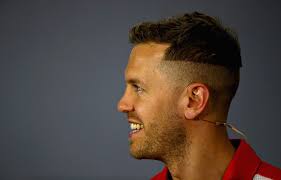 It shows vettel and he is causing quite a stir with his new haircut. Formula 1 Fans Are Roasting Sebastian Vettel Over His New Haircut