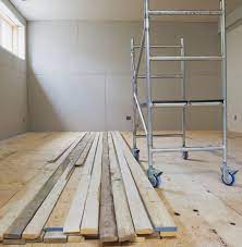 Take a 1x1m sheet of plastic (garbage bag would do) and tape it to the floor making sure it's sealed all the way around. Basement Subfloor Options