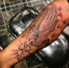 This image on the forearm will suit guys who like bigger tattoo designs. Rosary Praying Hands Catholic Tattoo On Forearm
