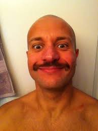 What can make me look better with a handlebar mustache?