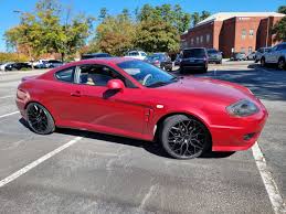 Image result for Wildberry Red 1999 Tiburon