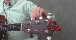 Any single guitar tuner here. How To Use A Chromatic Guitar Tuner Cyberfret Com