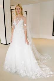 Behind The Scenes With The New Carolina Herrera Collection Bridalshops Carolina Herrera Collectio Designer Wedding Dresses White Bridal Dresses Bridal Dresses