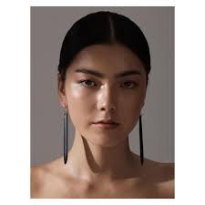 Queen Ebony Earrings by Liv Boyle. Exquisitely hand carved in reclaimed  black queen ebony with yellow gold hooks & rivets. Available online or view  in the gallery. www.xxoogallery.com 📷: @grant_tyrrell HMU: @claremoriarty_